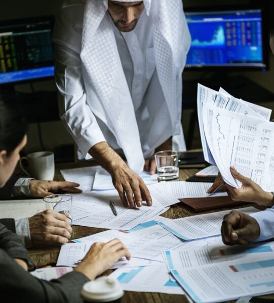 Group of business people working together in a meeting room